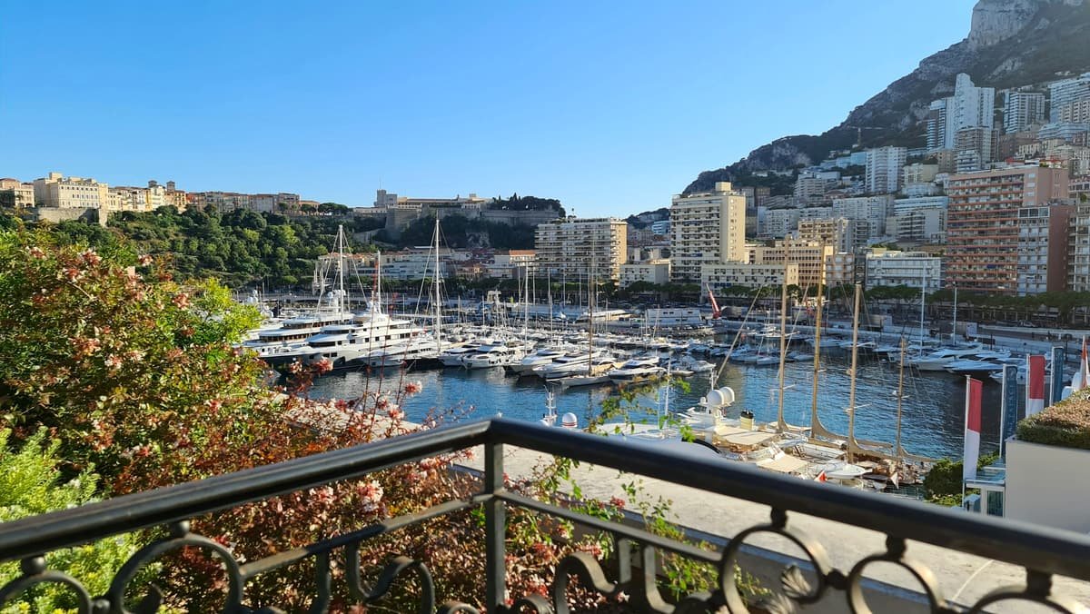 The yachts of the port of Monaco seen from a balcony