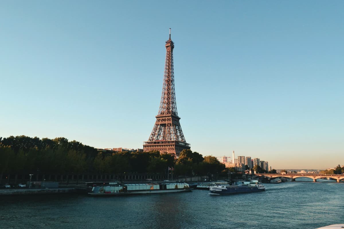 The Eiffel Tower at daybreak from the banks of the Seine