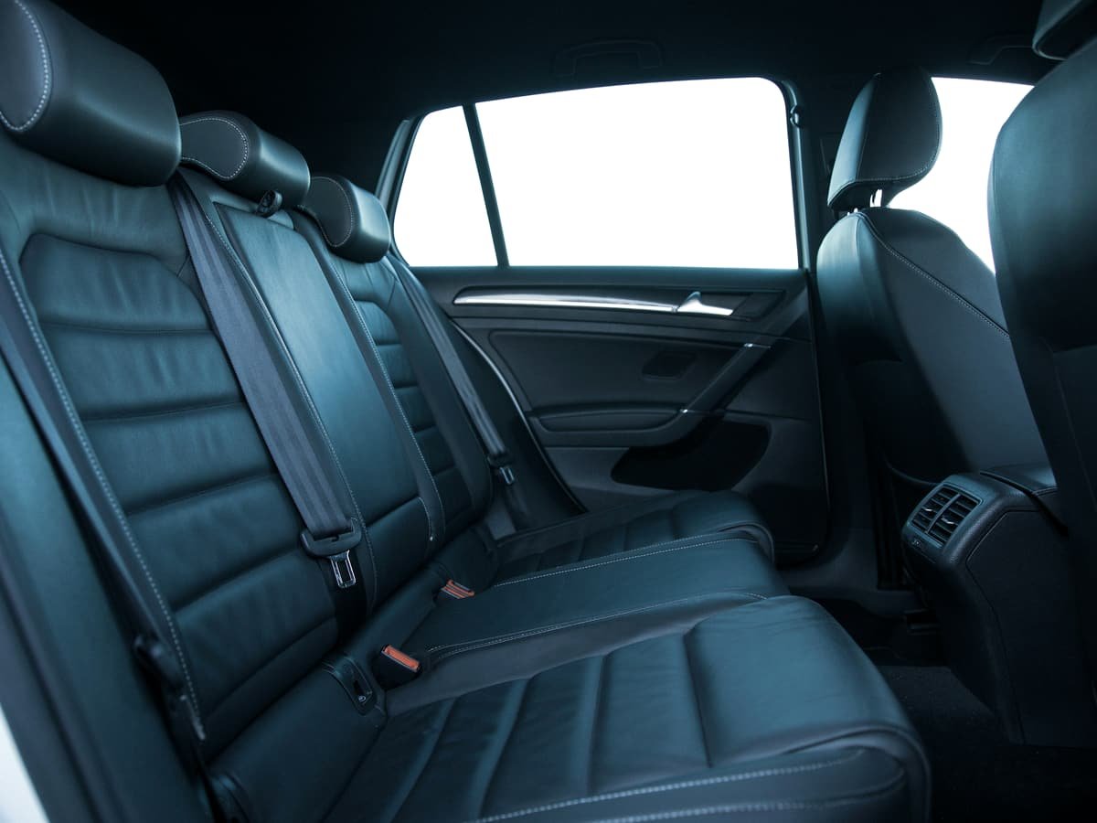 The leather rear seats of a sedan