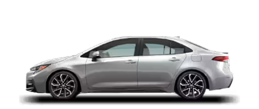 A compact sedan of the Toyota Corolla type, seen in profile